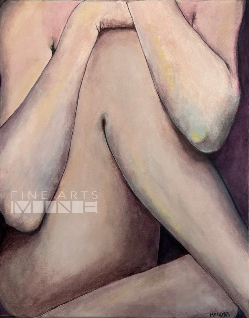 Nude sitting cross legged